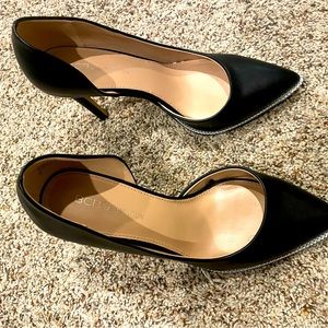 Black heels with silver detail. Excellent condition.  Size 7.5